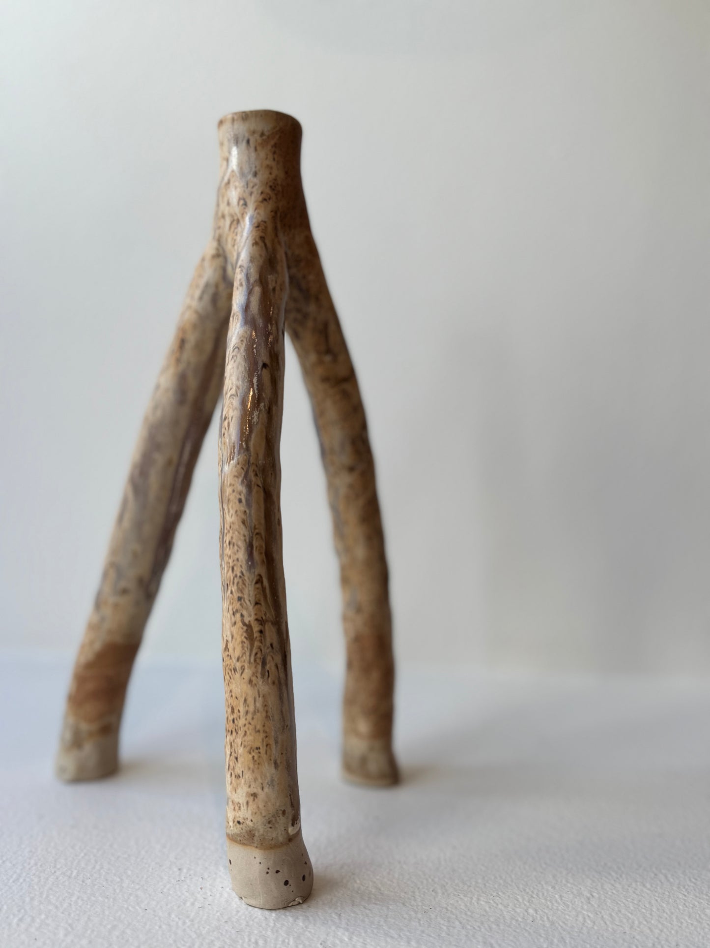 Trefotig ljusstake