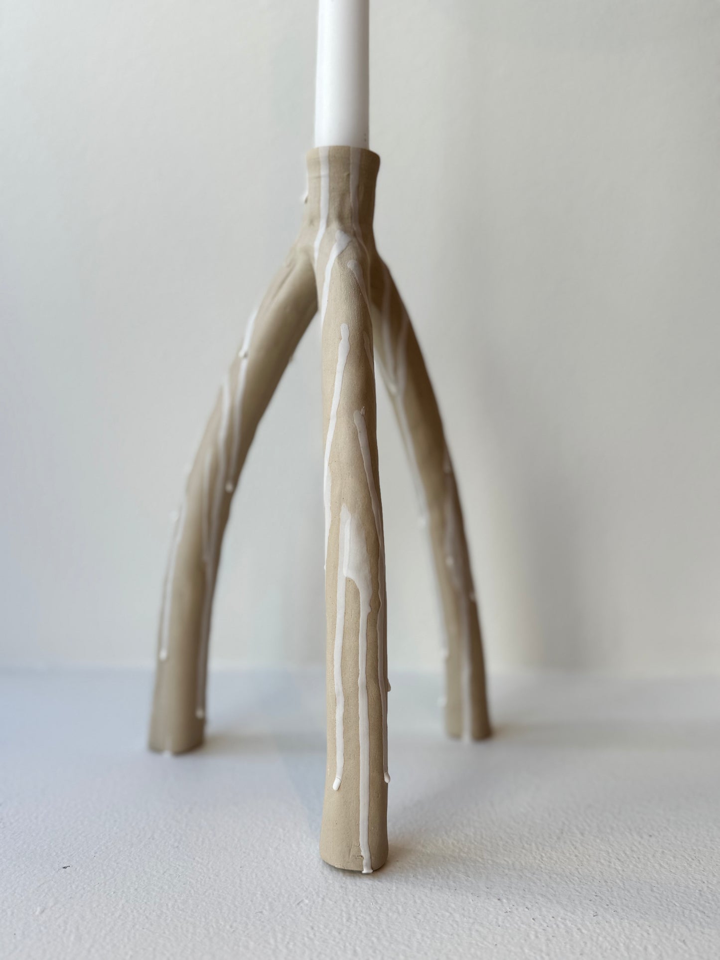 Trefotig ljusstake