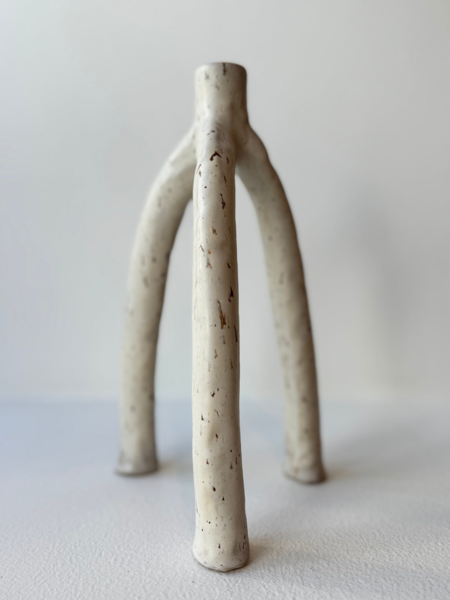 Trefotig ljusstake