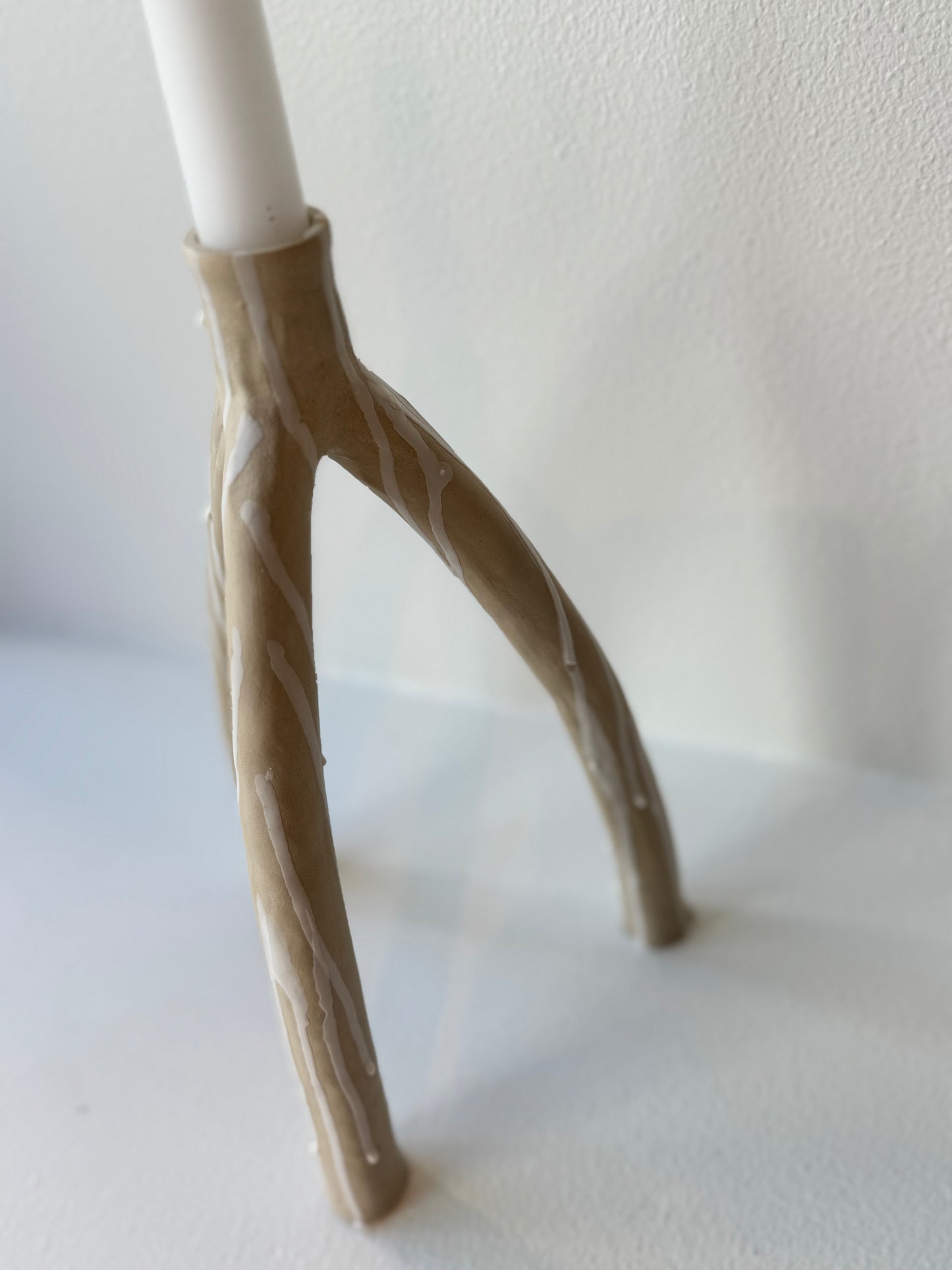 Trefotig ljusstake