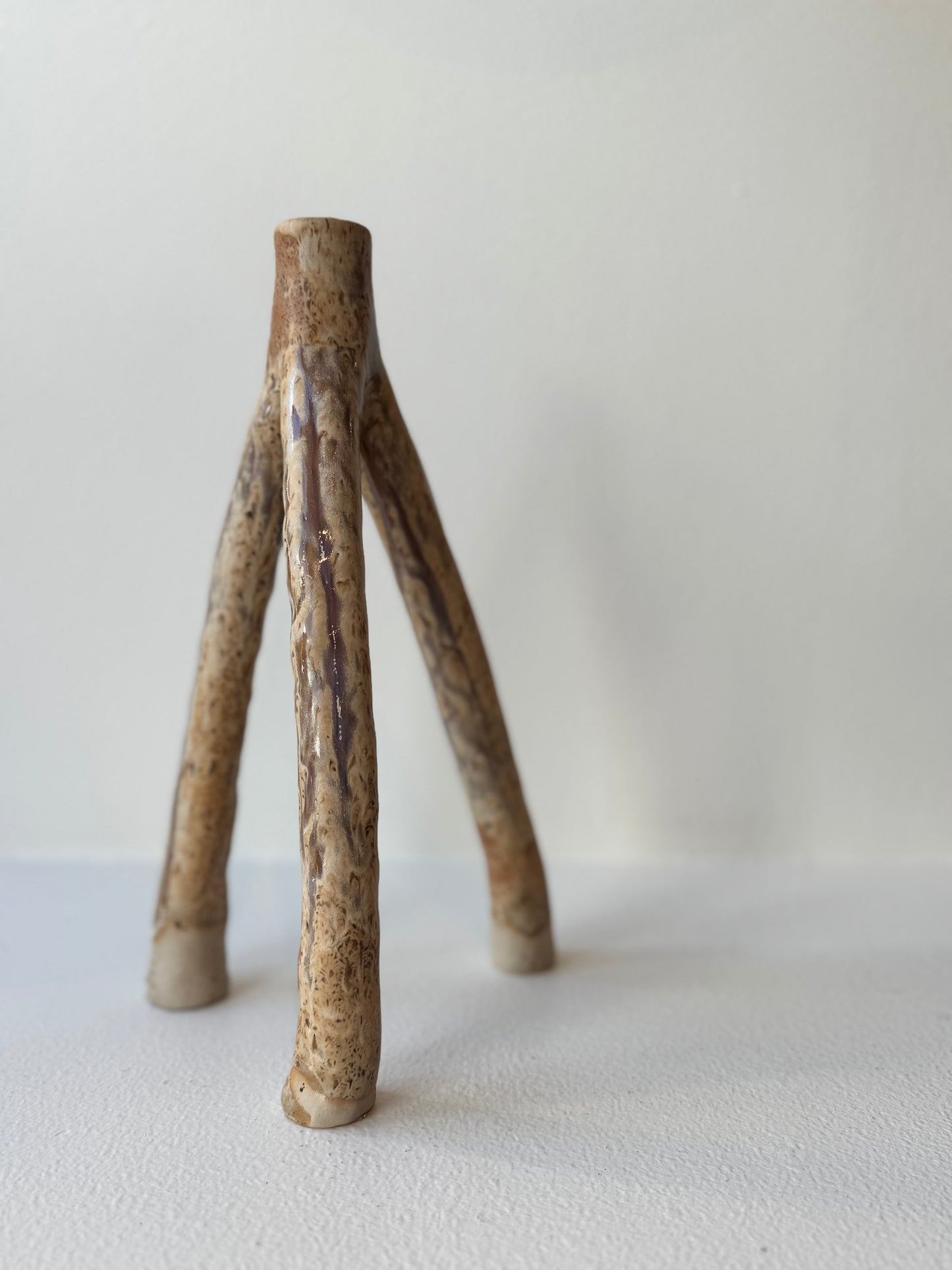 Trefotig ljusstake